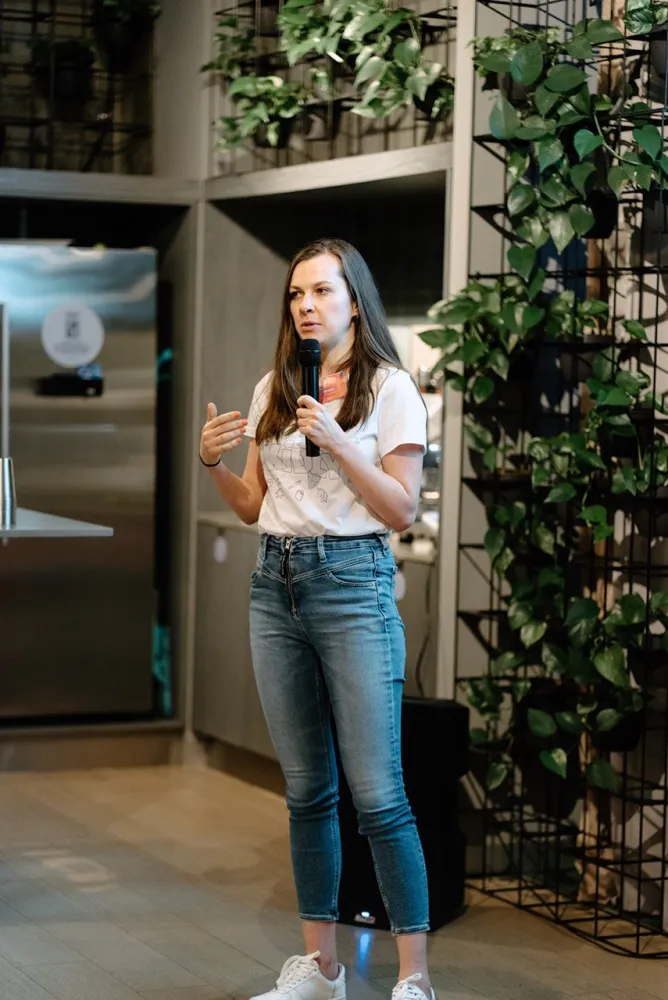 Anna Korol speaking at a startup community event